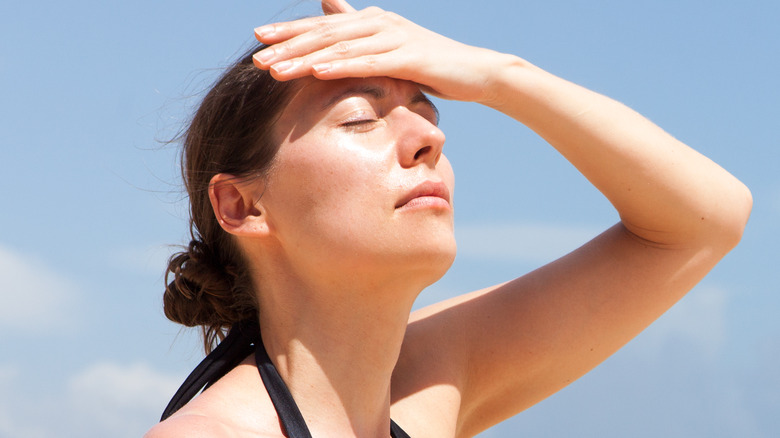 a woman exposed to the sun