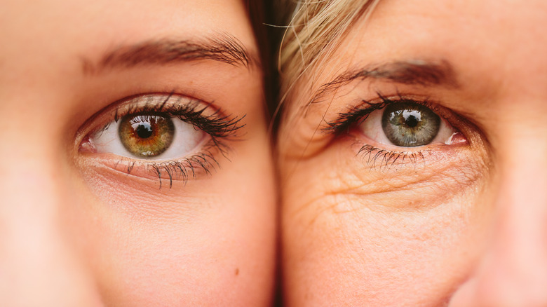 close-up of eyes of mother and daughter showing difference in wrinkles