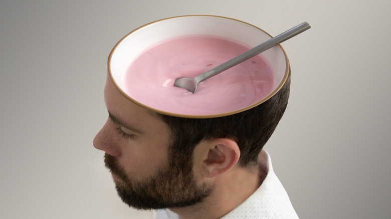 yogurt bowl on man's head
