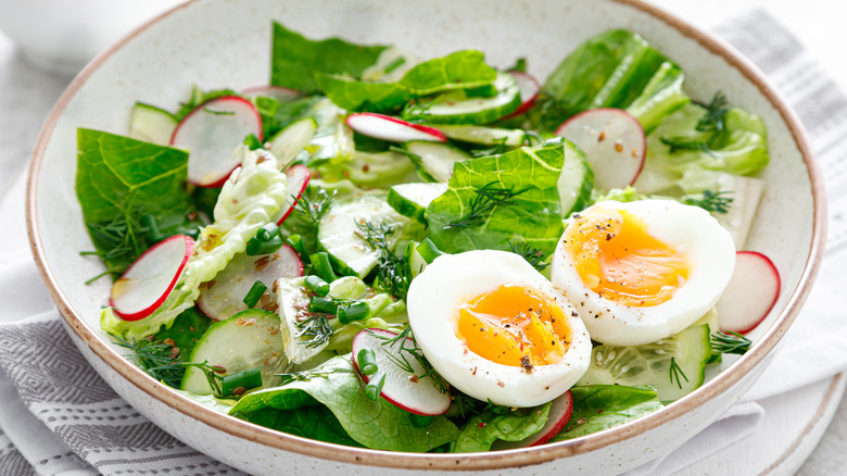 vegetable salad with soft-cooked eggs