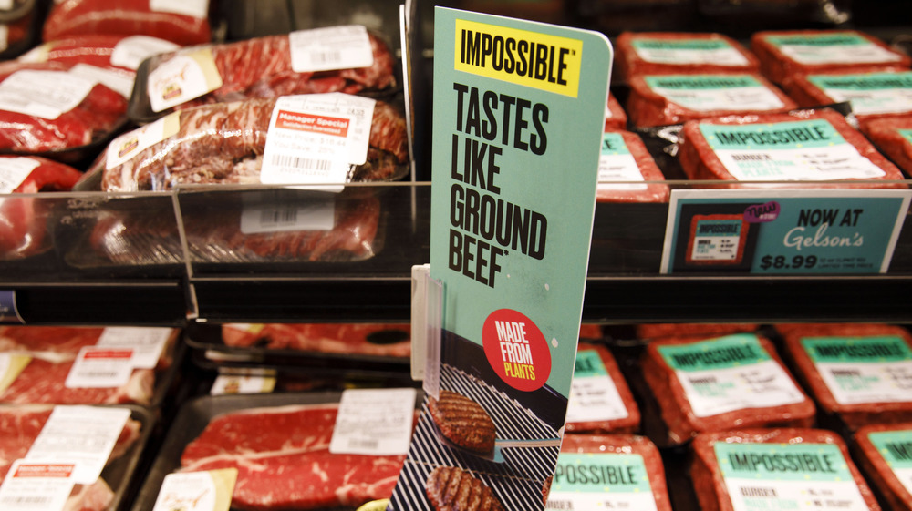 beef cuts beside Impossible Burgers