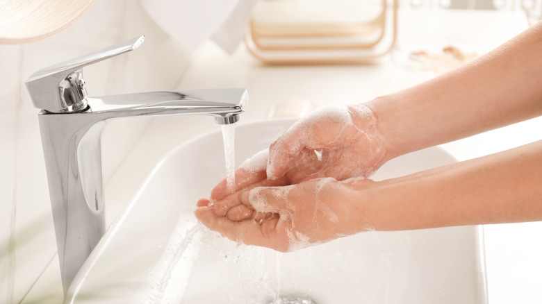 Person washing their hands