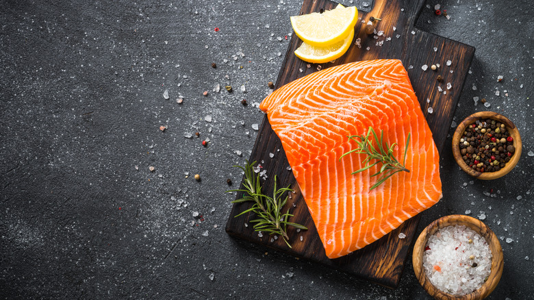 salmon on wooden board