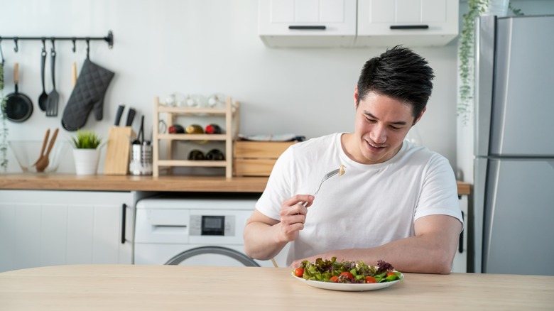 man eating healthy food