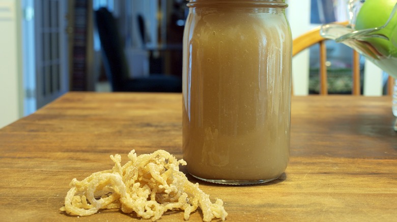 jar of sea moss gel with sea moss plant