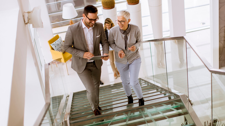 Man and woman taking the stairs