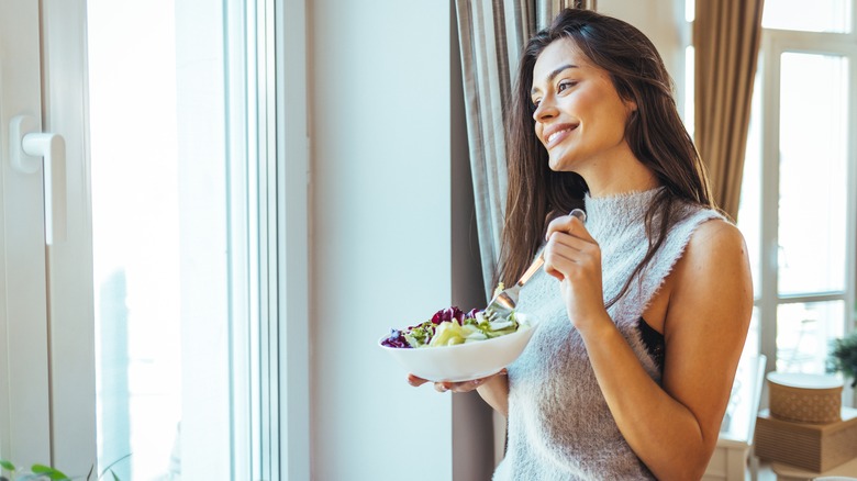 woman eating a salad