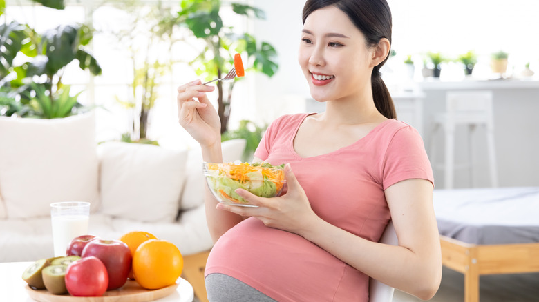 pregnant woman eating