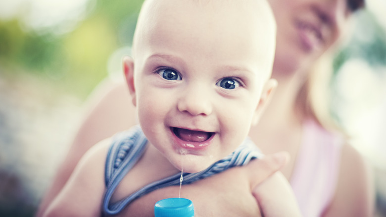 smiling baby drooling