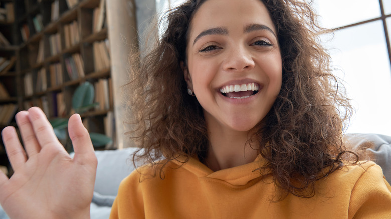 woman recording video for social media