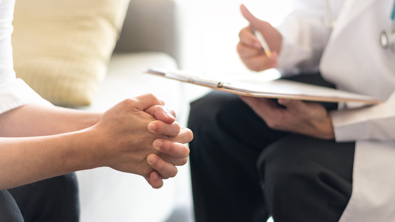 closeup of doctor-patient discussion