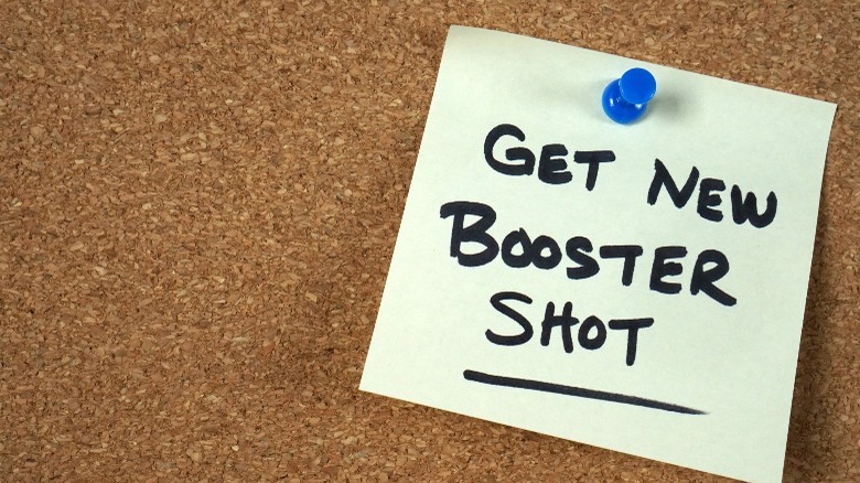 sticky note reminder about booster shot 