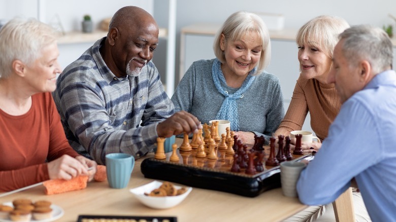 Older adults playing chess