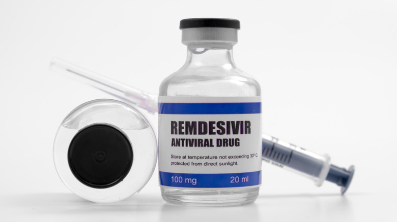 syringe and bottle of remdesivir