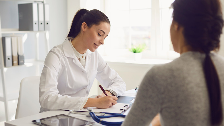 A woman visits her doctor