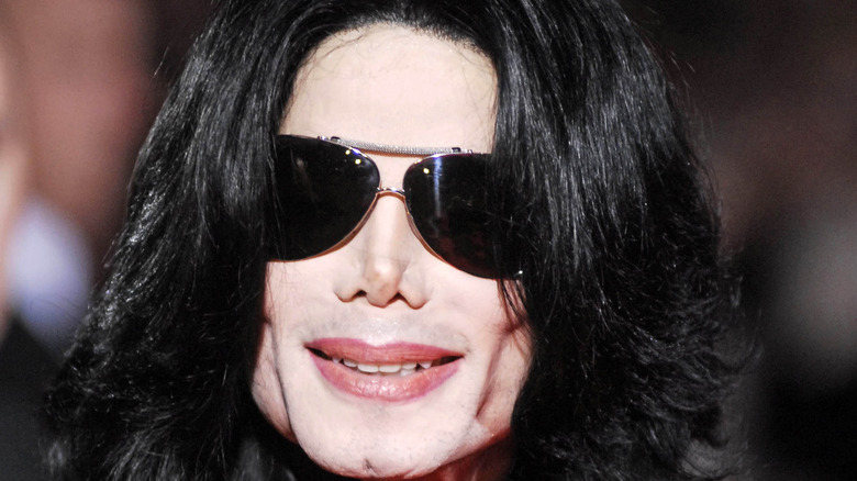 Michael Jackson wearing dark sunglasses