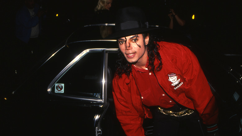 a young Michael Jackson in red