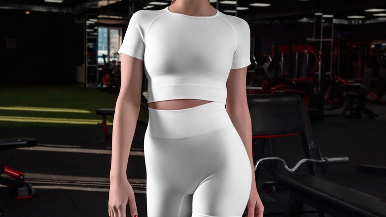 woman wearing compression gear inside gym