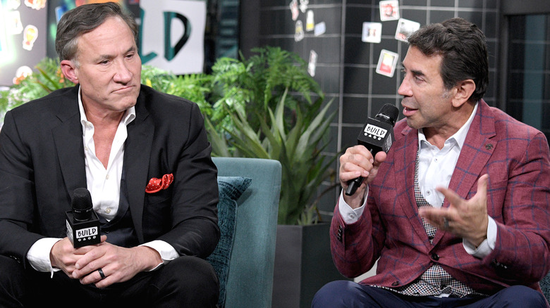 Dubrow and Nassif talking animatedly on a talk show