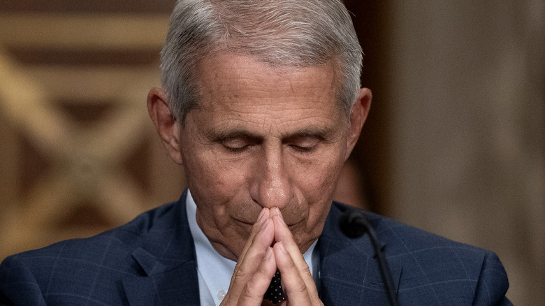 Anthony Fauci with bowed head