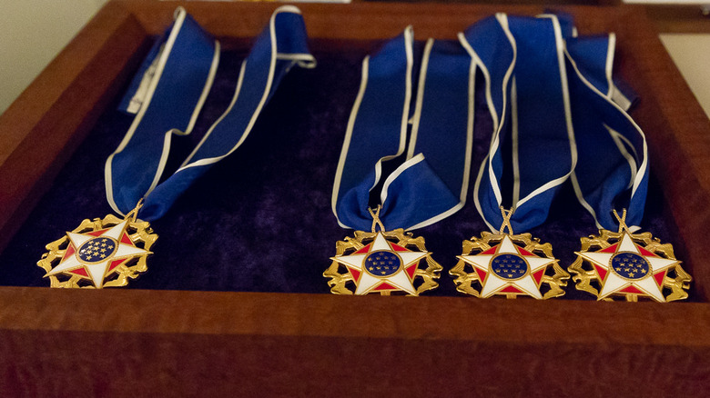 close up of presidential medals of freedom in box