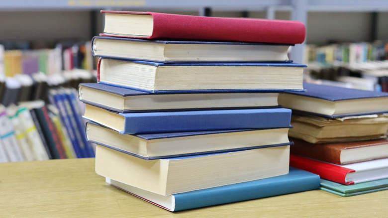 stacks of multicolored library books