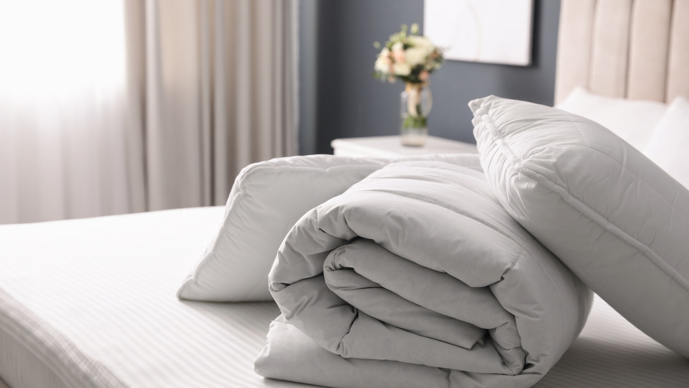 white bedding linens