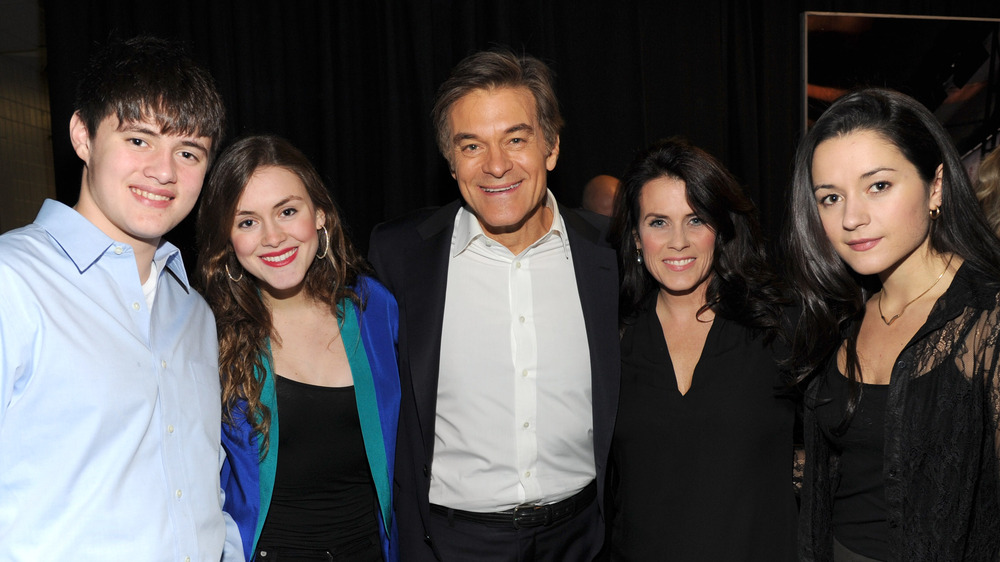 Dr Oz's with his family, all posing
