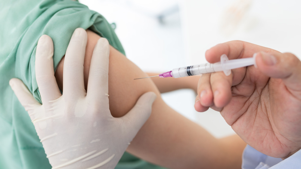 Immunization shot in arm