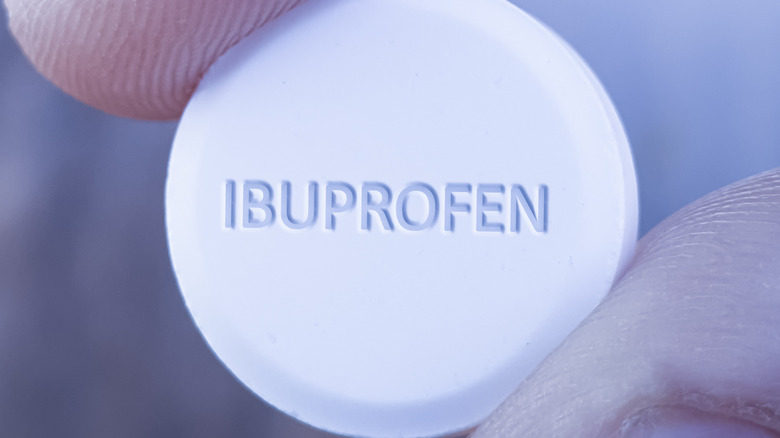 close-up of a single ibuprofen tablet