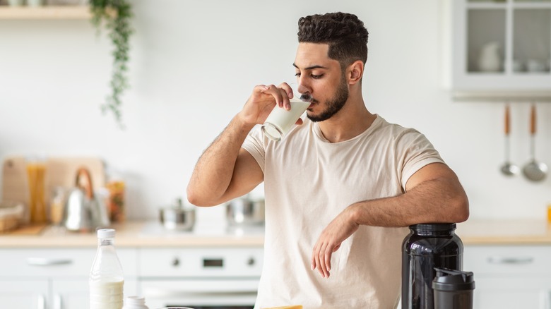 Bodybuilder drinking protein shake