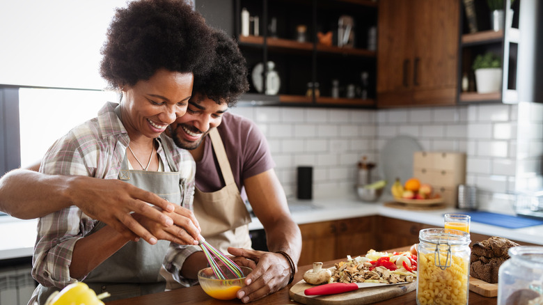 couple cooking in the kitchen