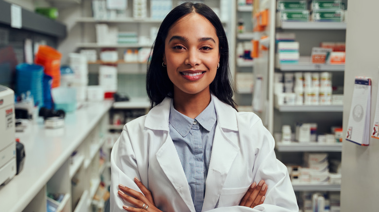a smiling female pharmacist