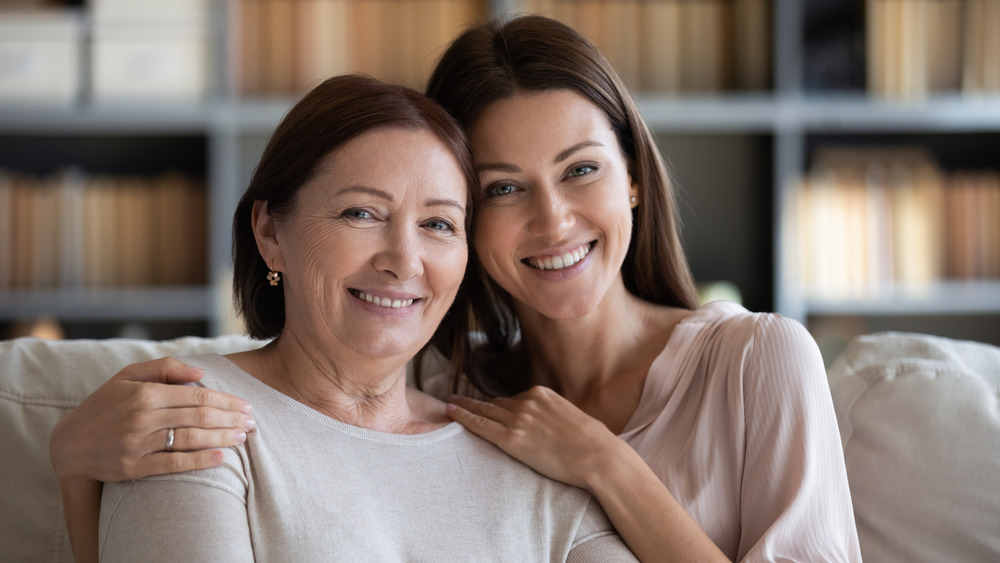 mother and daughter smiling together