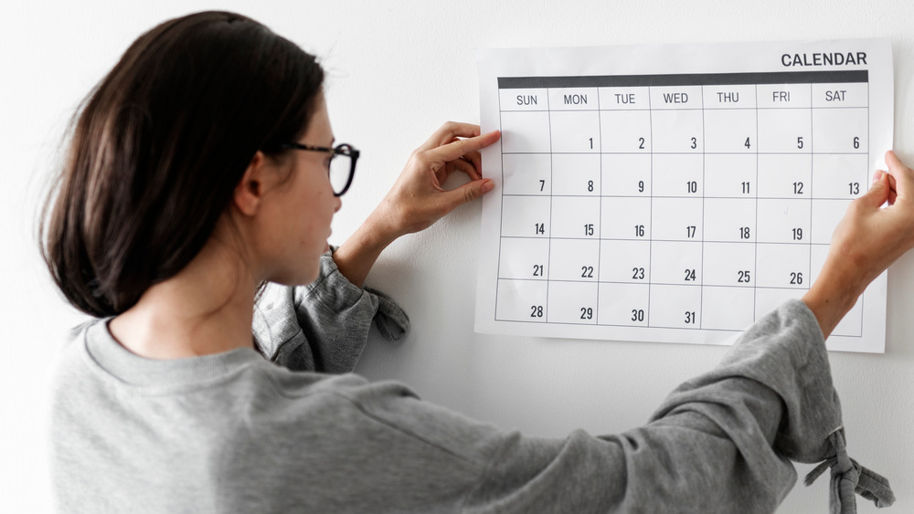 Woman checking calendar