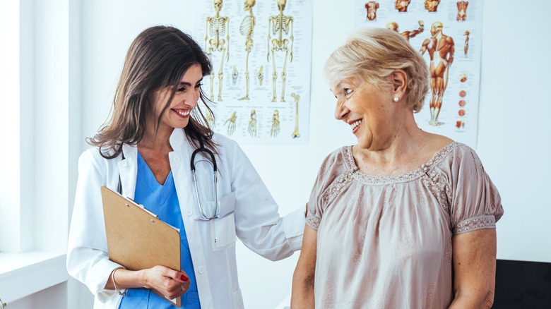 older woman with doctor