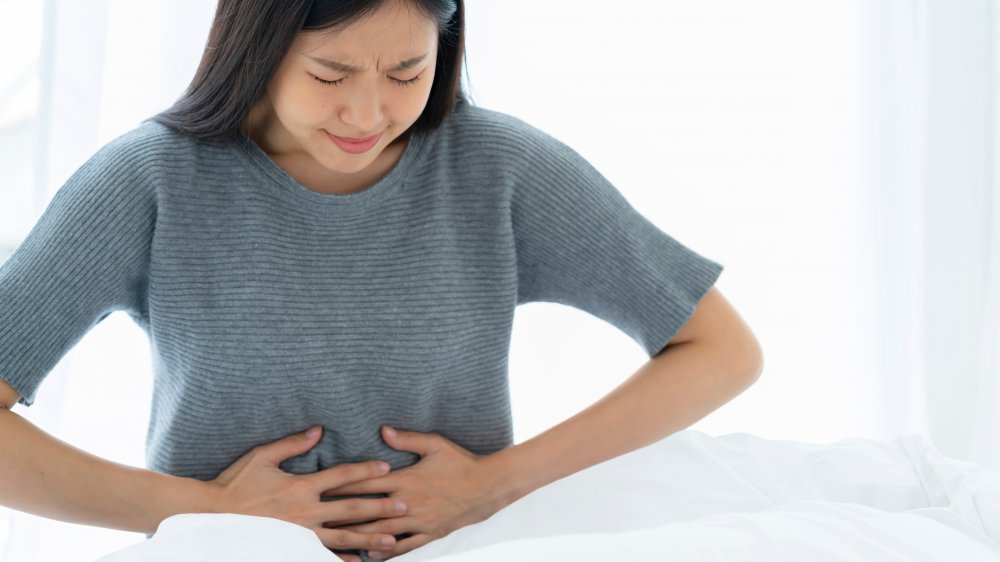 Woman in stomach pain