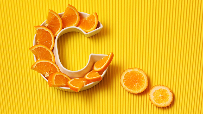 Orange slices forming the letter C