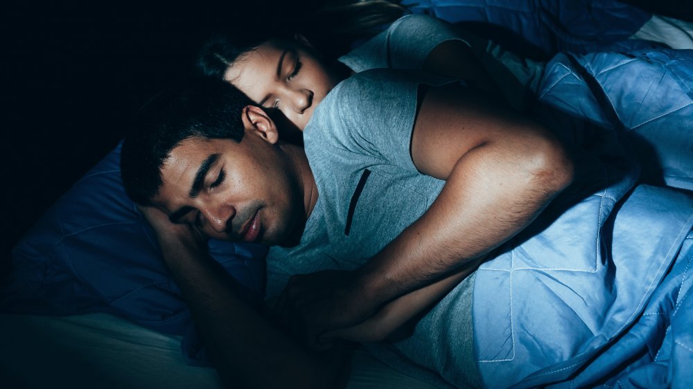 sleeping position of couple in a relationship