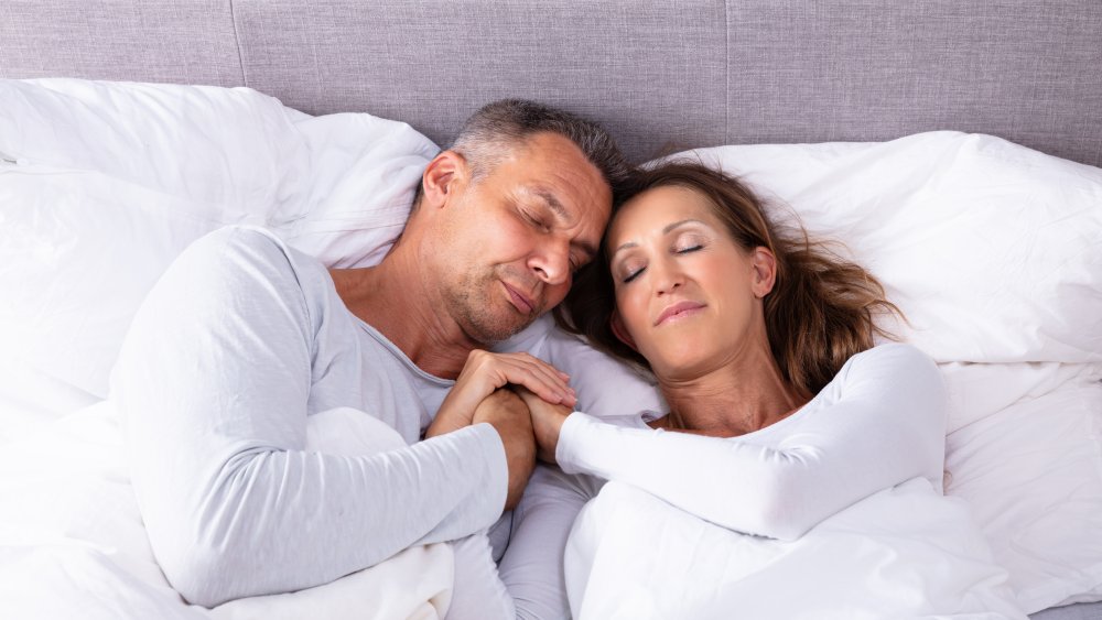 sleeping position of couple in a relationship