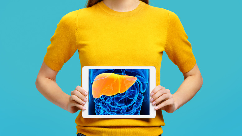 person with tablet with liver