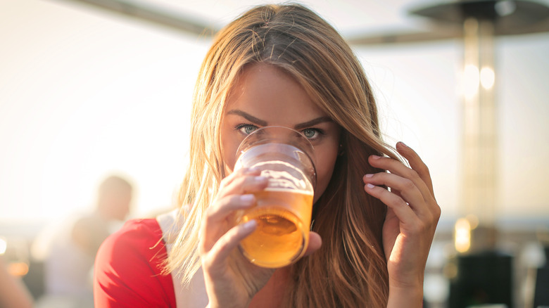 woman drinking beer