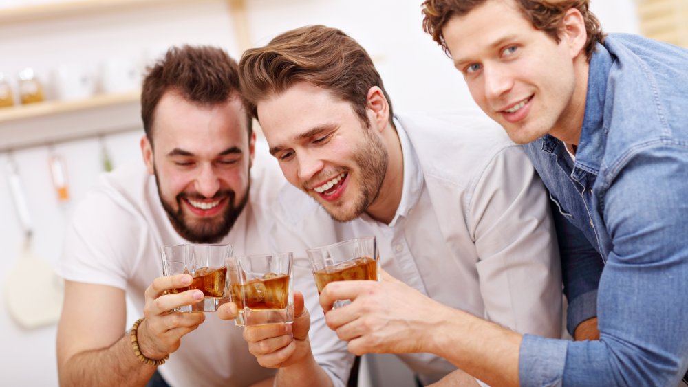 Men drinking whiskey