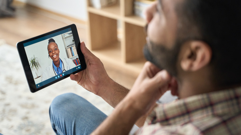 Man on doctor telehealth call