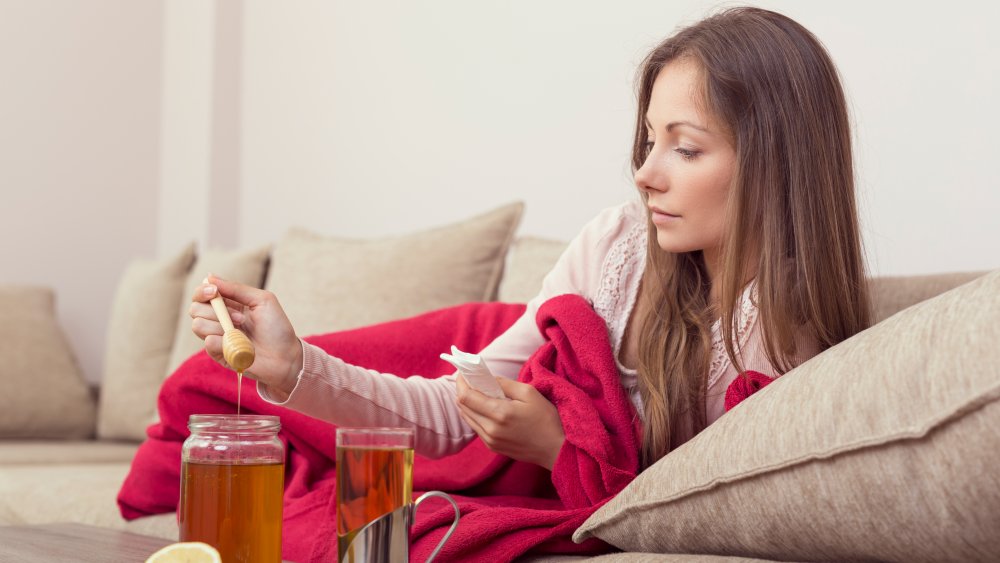 woman resting and drinking tea