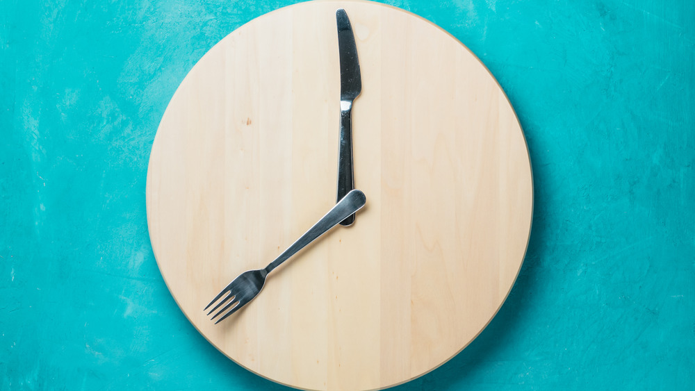 Wooden tray with fork and knife