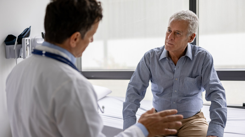 man with doctor in office visit