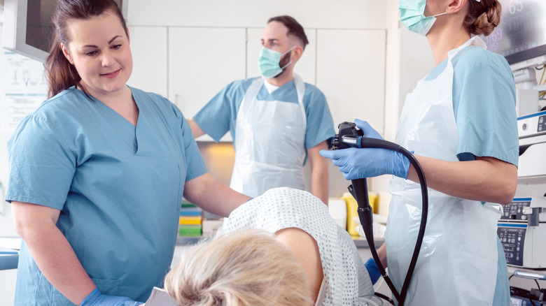 Doctors preparing their patient for a colonoscopy