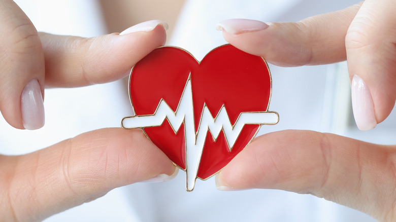 close-up of heart pin with EKG