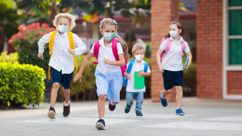 children wearing masks 